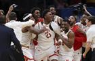 Derik Queen of the Maryland Terrapins celebrates with teammates after the the second round of the NCAA Men's Basketball Tournament against the Colorado State Rams