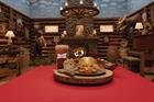 Virtual log cabin inside with Sonic burger, onion rings and soda
