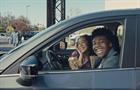 People eating Taco Bell in a car