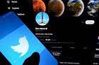 (SOPA Images/Getty Images) A phone and Twitter page