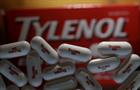 Photo illustration of Tylenol pills in front of a box
