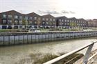 Review: Housing development on a riverside industrial site