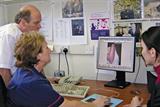 Mr Dodds (left) examined leg ulcer wounds using the LUTM system to great overall success (Photograph: Author image)