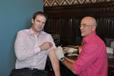 Health minister Dr Dan Poulter receives his flu vaccine at the clinic (Photo: Chris Raphael)