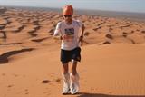 Dr Andrew Murray running in the Sahara desert