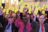 BMA members, including GPC chairman Dr Laurence Buckman (right), vote on motions at the SRM