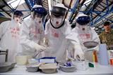 Ebola volunteers: medical staff train to work in a Sierra Leone treatment centre (Photo: DFID)