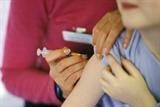 Child receiving an MMR vaccine