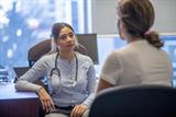 Female GP consulting with a female patient