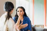 A female manager listening in a meeting