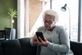 Older woman looking at her smartphone