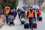 Refugees head for the border in Uzhhorod, Ukraine