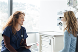 Female patient in consultation with healthcare professional