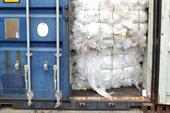 The bales of contaminated waste found in a shipping container
