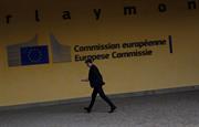 A man walks past the European Commission headquarters in Brussels, July 2022. The EU executive is one of the more transparent institutions when it comes to recording meetings with lobby groups. Photo: Danil Shamkin/NurPhoto via Getty Images