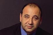 Wal-Mart hands global role to Rick Bendel