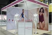 The Speedo Sculpture stand being set up at Glow