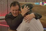 Big Brother winner Luke Anderson hugs a fellow contestant