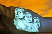 Giant image of party leaders projected onto White Cliffs of Dover