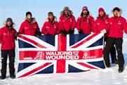 Simon Daglish (centre): raising the flag for the troops
