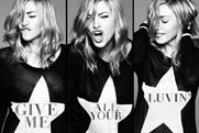 Madonna: premiers 'give me all your luvin' on Clear Channel screens around the world