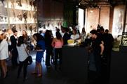 Guests sipped beer and cocktails as they browsed the new collection