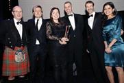 Brand of the Year 2012: P&G's UK marketing boss Roisin Donnelly (centre) pics up the award