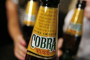 Molson Coors reduces marketing spend in Cobra review