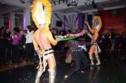 Guests do the limbo at Madame Tussauds
