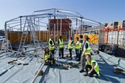 Young crewers get to work on the mirror tent