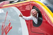 Sir Richard Branson: his Virgin Trains group retains West Coast line for two years