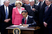 Obama signs the Credit Card Accountability, Responsibility and Disclosure Act last Friday