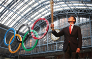 Seb Coe holds the Olympic torch