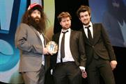 Only Revolution Award winners can look this cool while holding the trophy upside down