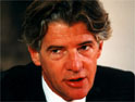 Green: staying on until the merger goes through