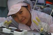 Apple iPhone girl: factory worker