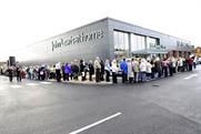 Shoppers Queue on opening day at the John Lewis at home store in Poole