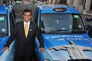 Flavio Dino: with branded London cabs