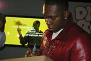 Dizzee Rascal bigs-up Nike's venue at his album and trainer launch party
