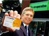 Patrick Allen, The Co-operative Group marketing director and his membership card