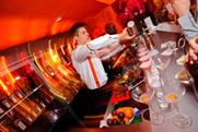 Bar staff serve up Cointreau cocktails at the Privé pop-up