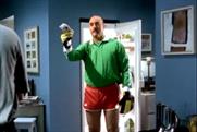 Bruce Grobbelaar emerges from a fridge with a wad of cash