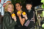 Guests have their photo taken by Cointreau and Liberty London photobooth