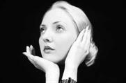 Women overturn conventional wisdom and cut back on lipstick in this recession