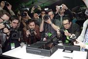 Xbox One...contains live TV, video on demand and social media within a traditional games console