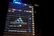War on Want: targeted Adidas with tower block projection