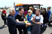 Green & Black's taste specialist Brandt Maybury hands out chocolate samples in Brighton