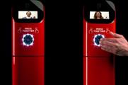 The machines featured screens for videos as well as a button which revealed the coffee dispenser