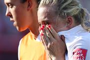 Laura Bassett is consoled after scoring an own goal in England's semi-final defeat by Japan