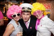 Guests dressed up in wigs and glasses at the Chew Events launch